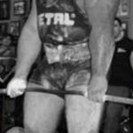 muscular man lifting weights